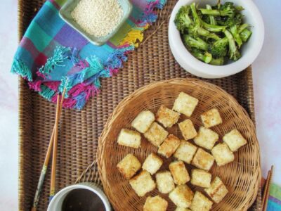 crispy tofu bites with tangy sauce, and a side of broccoli
