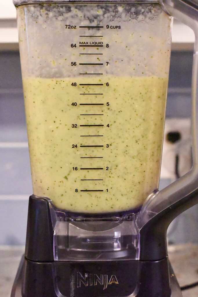 Zucchini mac n cheese in a blender after being blended.