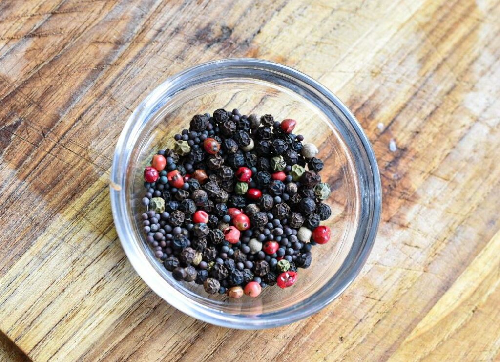 spices for corned beef and cabbage in a small glass bowl
