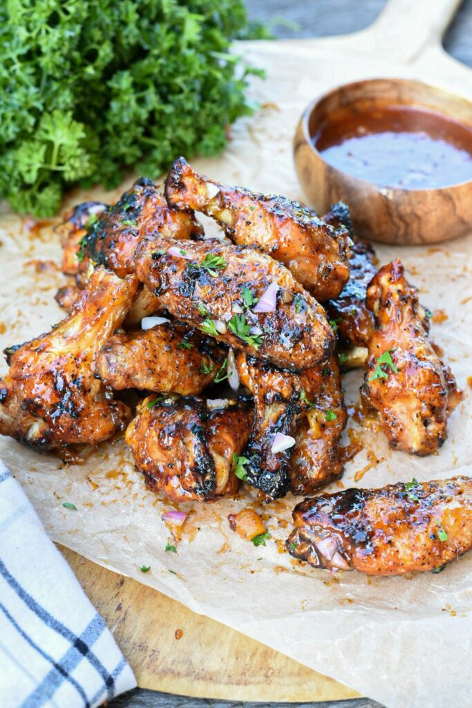 A pile of chipotle ginger orange grilled chicken wings