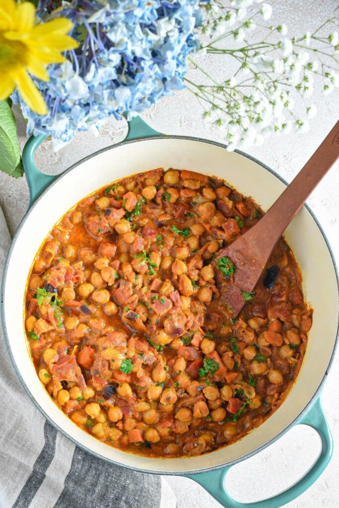 An overhead shot of freezable curried chickpeas in a dutch oven.