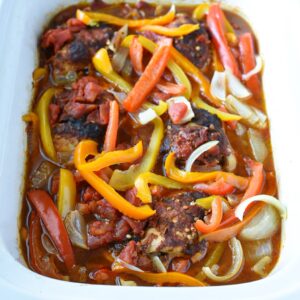 A white crockpot filled with healthy chicken fajitas recipe