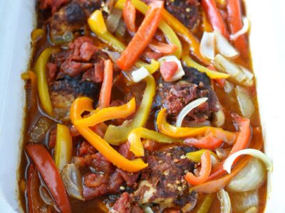 A white crockpot filled with healthy chicken fajitas recipe