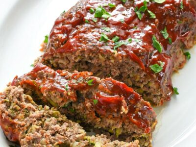 A loaf of healthy meatloaf cut into two pieces
