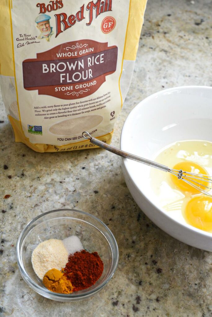 Brown rice flour, eggs and spices for fish