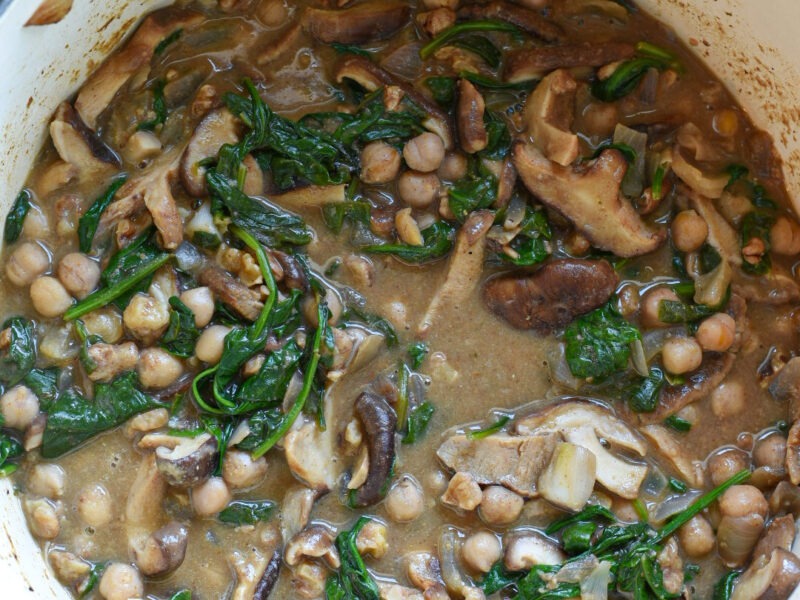 Barley salad with chickpeas A large dutch oven filled with sauteed vegetables in a lemon gravy sauce.