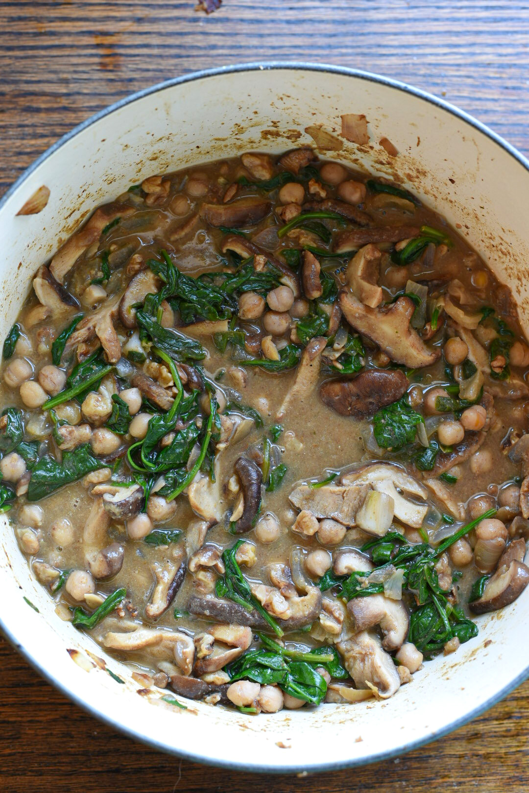 Barley salad with chickpeas A large dutch oven filled with sauteed vegetables in a lemon gravy sauce.