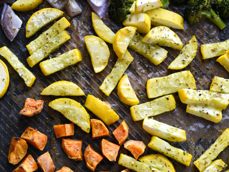 Roasted Vegetables Roasted vegetables on a large baking sheet
