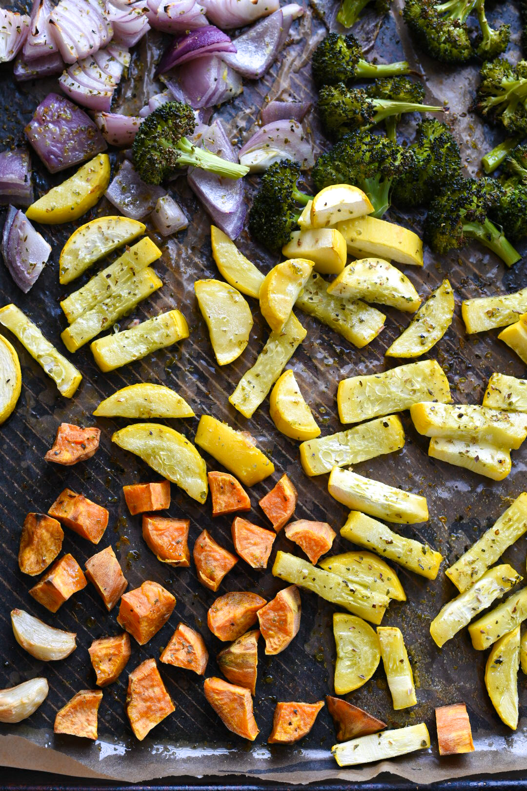 Roasted Vegetables Roasted vegetables on a large baking sheet