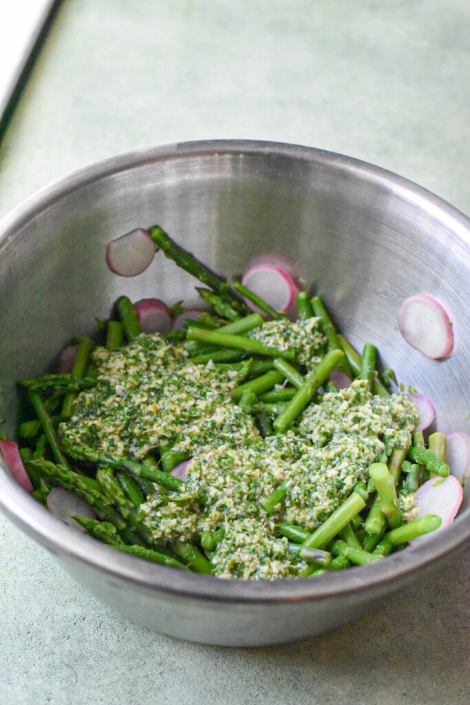 Asparagus and radishes covered in a gremolata sauce