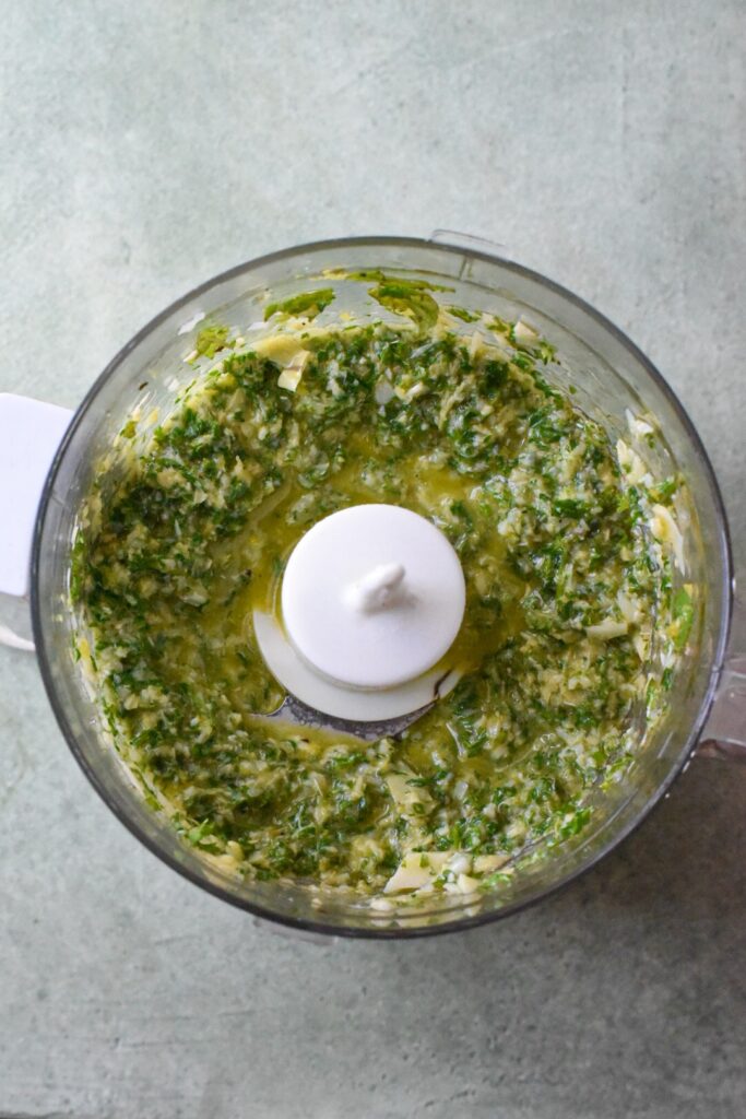 mint gremolata recipe A processed mint gremolata sauce in a food processor