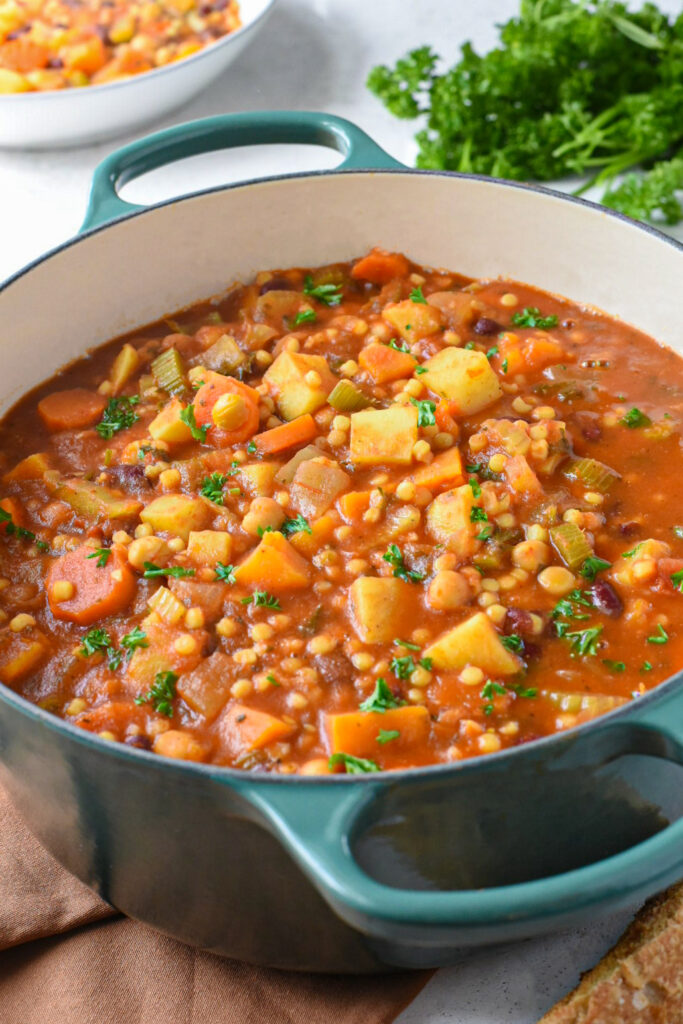 sardinia minestrone soup recipe A le creuset pot filled with sardinian minestrone soup.
